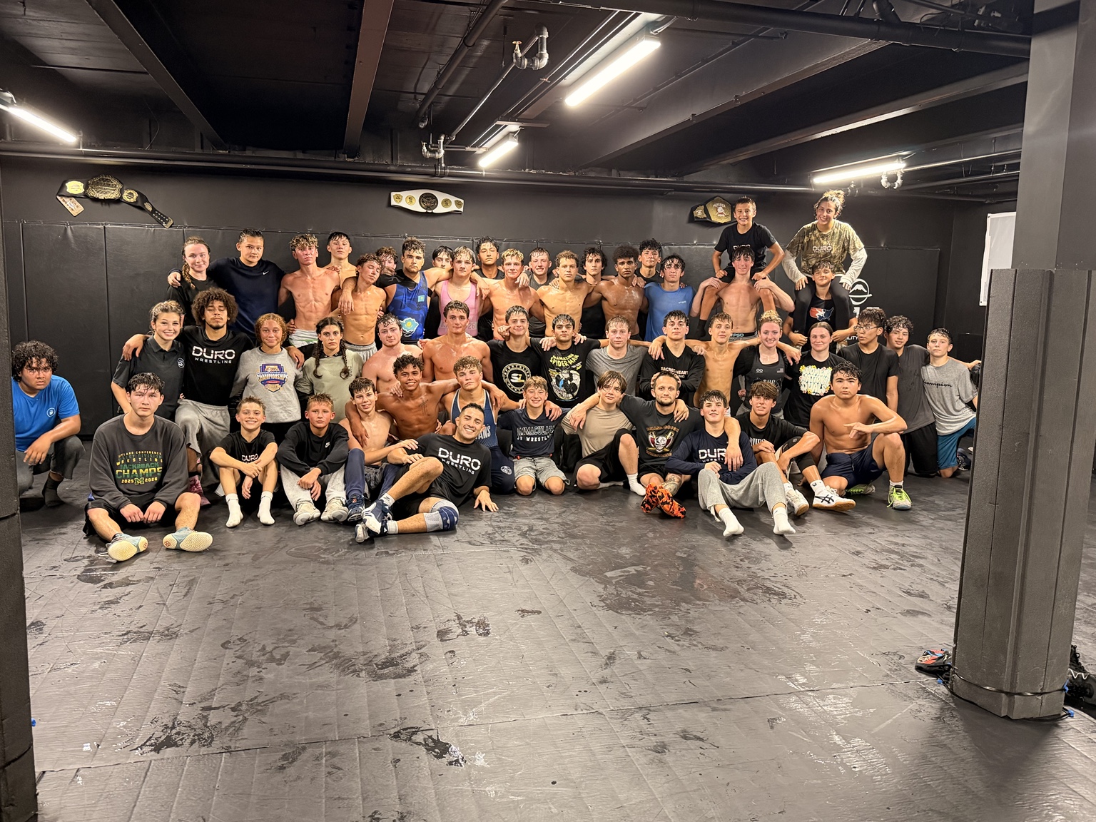 DURO wrestling team together on the mats at the Raritan gym
